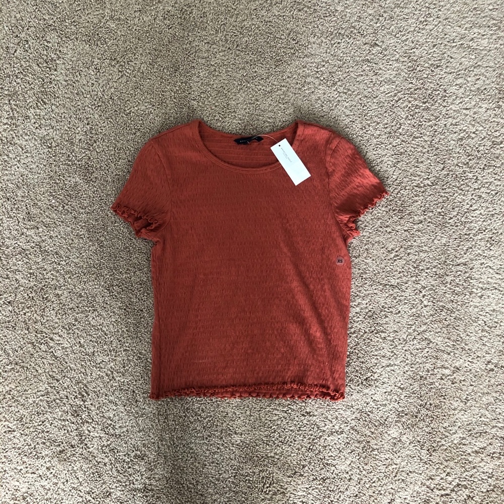 Salmon color American Eagle shirt